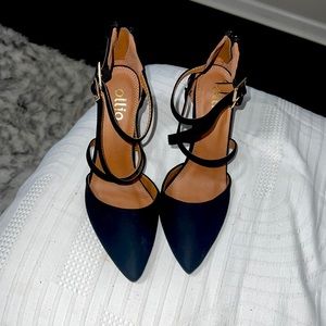 Black heels , never worn